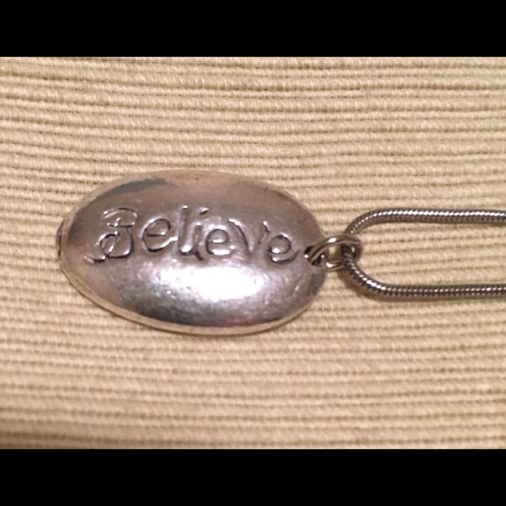 Believe pendant with chain.